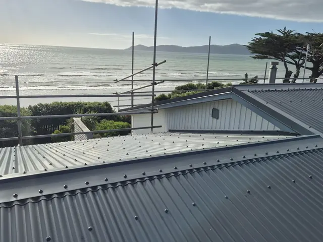 New Colorsteel roof on a coastal home with the sea behind
